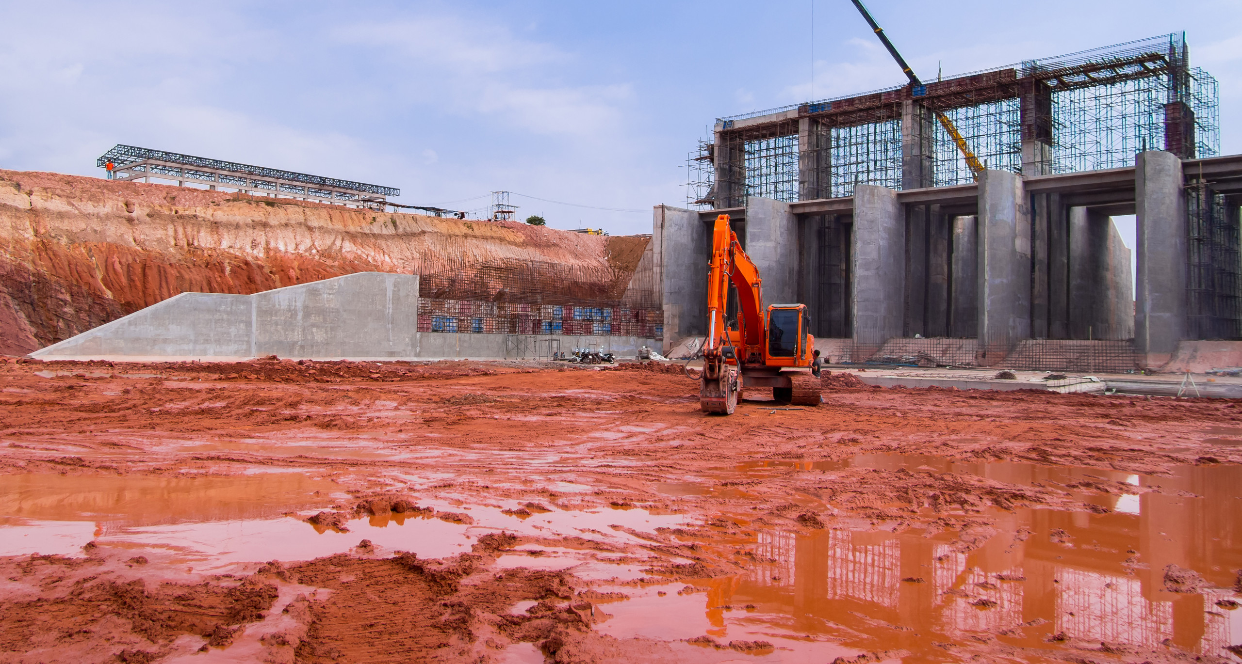 Orange digger on a construction site